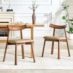 2 walnut colored solid wood dining chairs, with khaki PU soft cushions and curved backrests that fit the curves of the back, suitable for home dining.