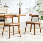2 walnut colored solid wood dining chairs, with khaki PU soft cushions and curved backrests that fit the curves of the back, suitable for home dining.