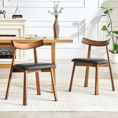 2 walnut colored solid wood dining chairs, with khaki PU soft cushions and curved backrests that fit the curves of the back, suitable for home dining.